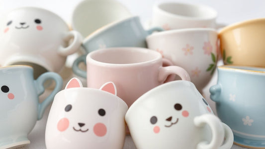 Cute kawaii tea cups with charming designs.