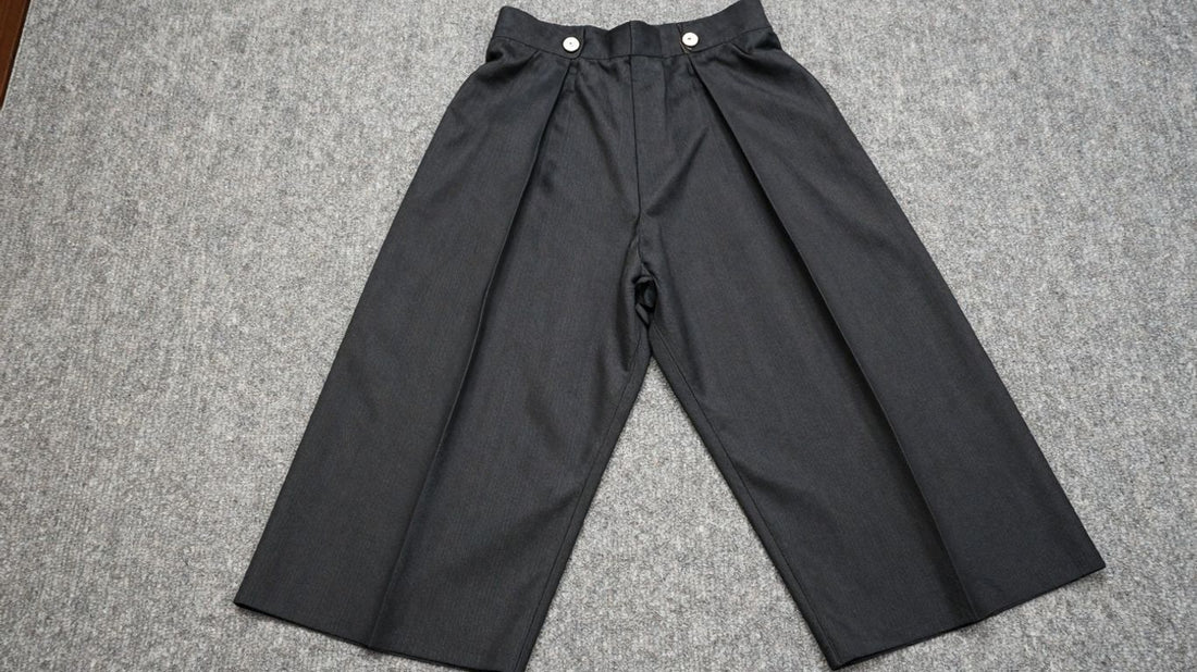 Stylish black hakama pants, modern traditional Japanese attire.