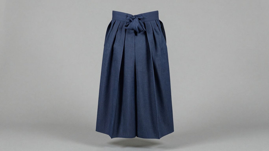 Traditional Japanese hakama trousers, indigo fabric, pleated.