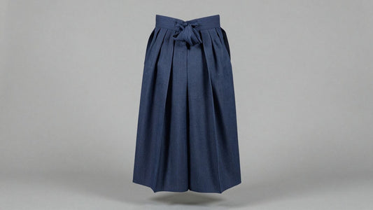 Traditional Japanese hakama trousers, indigo fabric, pleated.