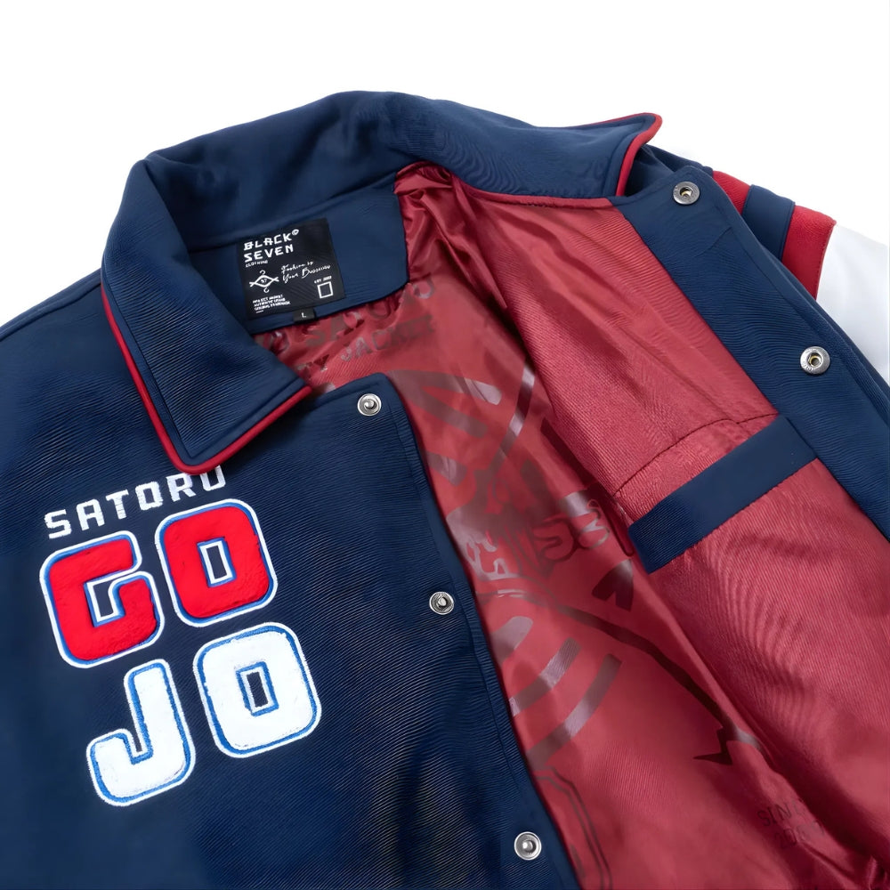 Angled view of Gojo Satoru jacket with embroidered white sleeve and back artwork